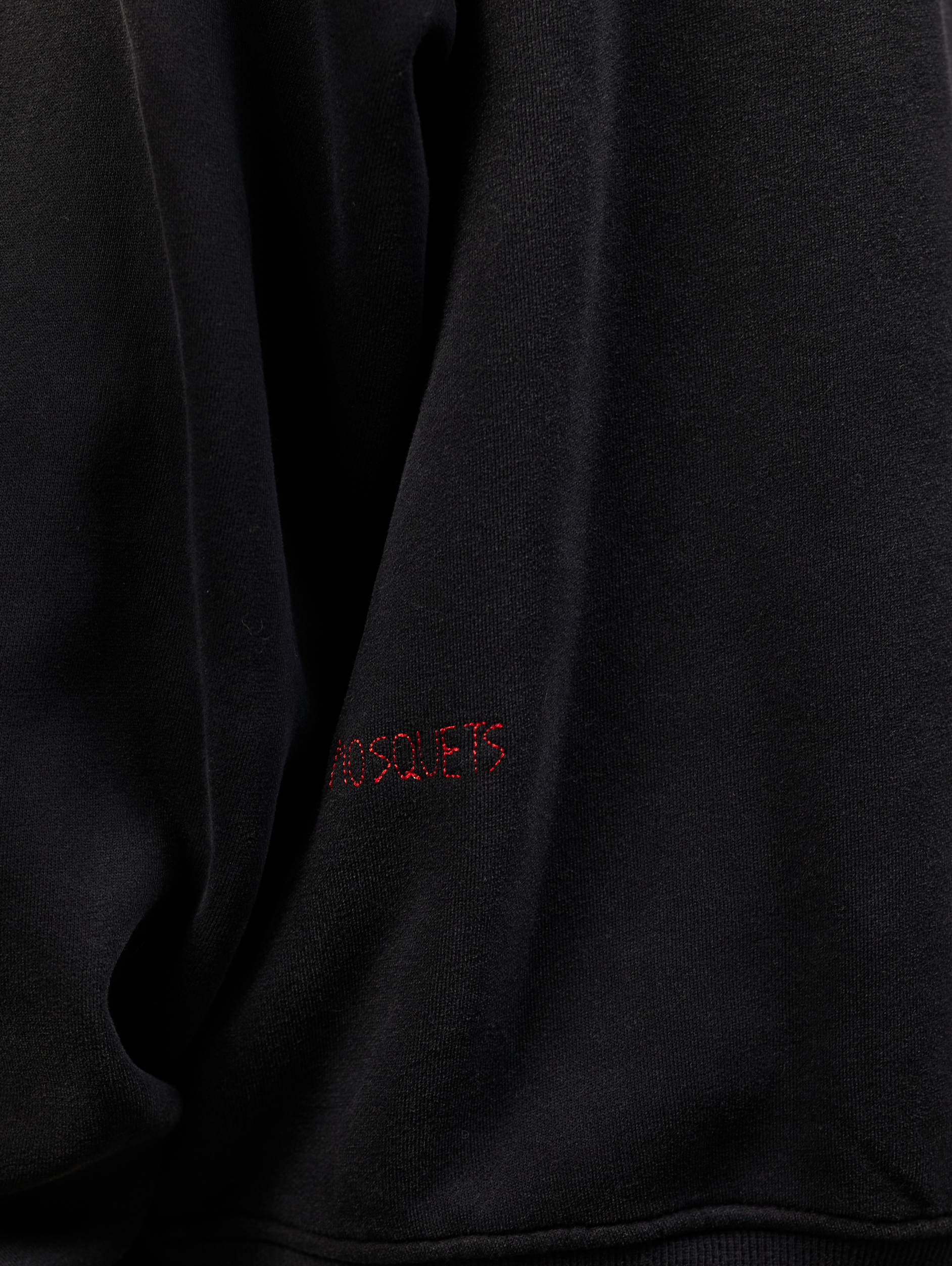 OVERSIZED BLACK ZIP-UP HOODIE WITH PATTERNED SLEEVES FOR STYLISH LAYERING