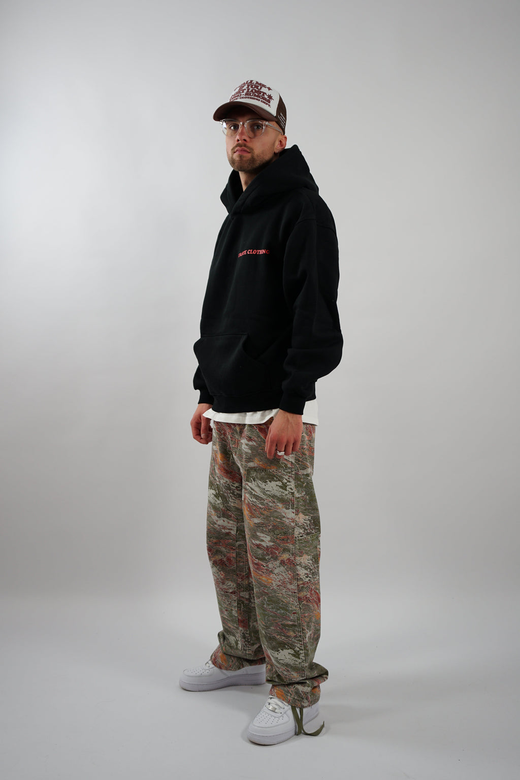 OVERSIZED HOODIE WITH RED TEXT IN BLACK