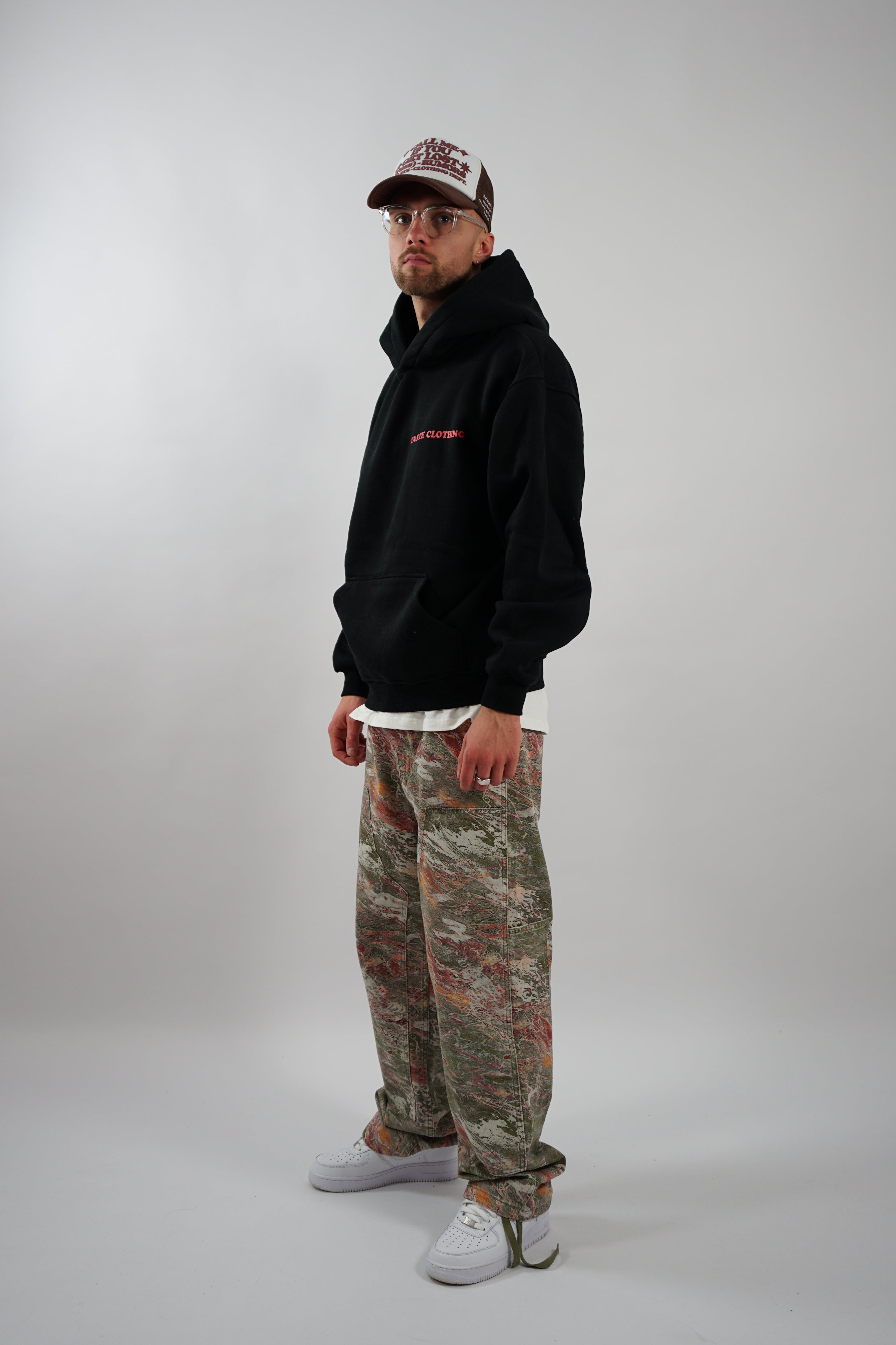 OVERSIZED HOODIE WITH RED TEXT IN BLACK