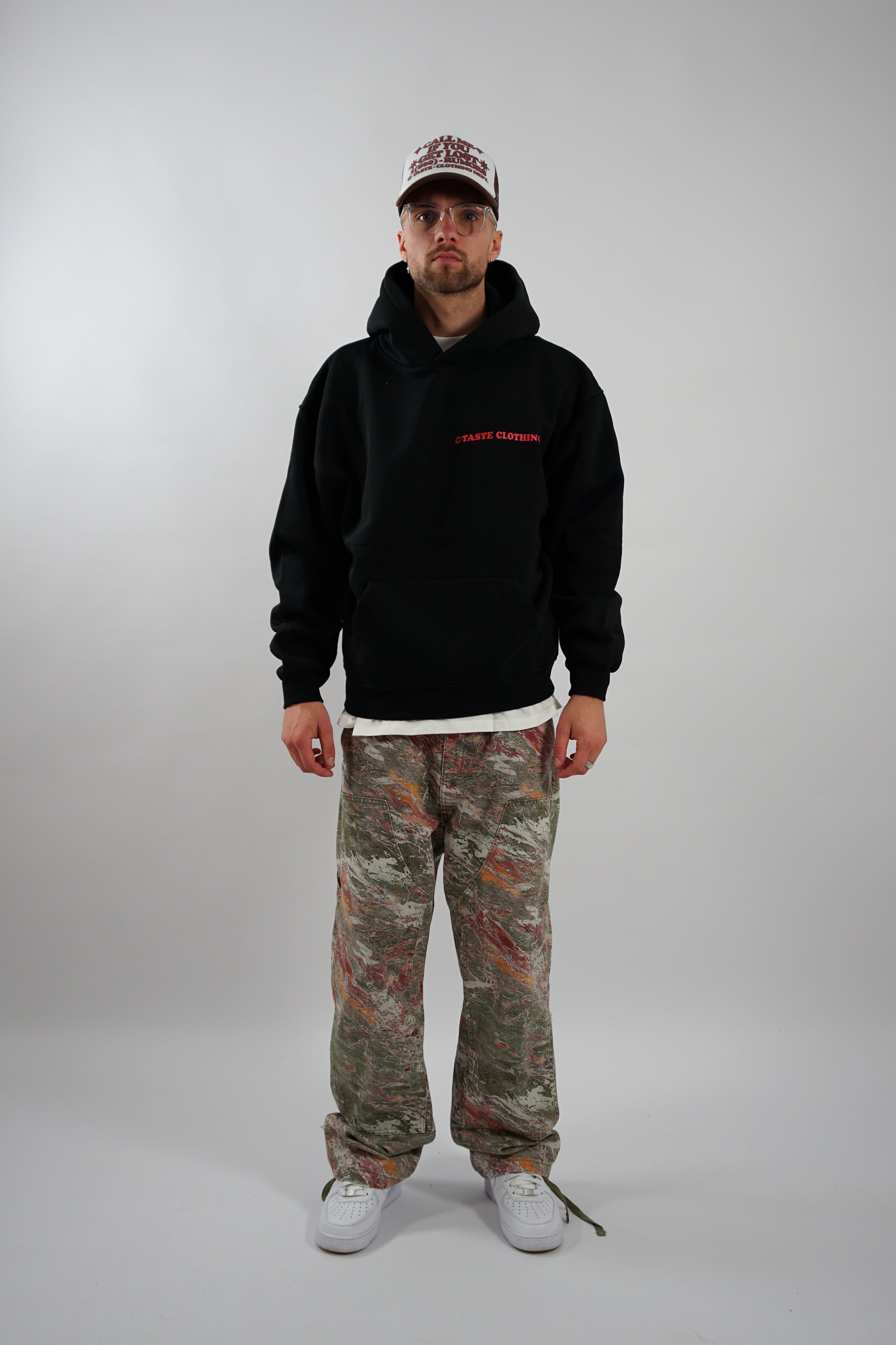 OVERSIZED HOODIE WITH RED TEXT IN BLACK