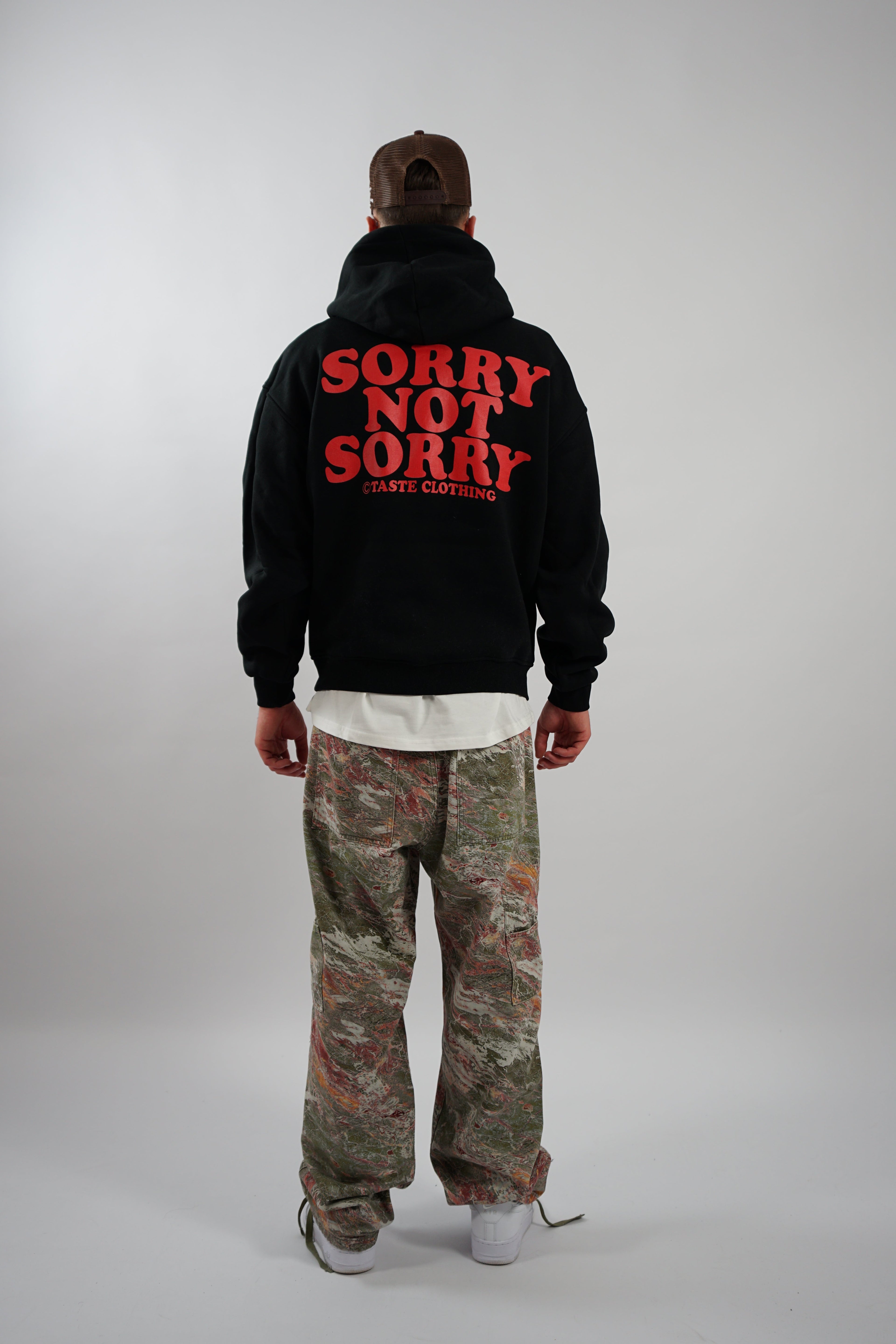 OVERSIZED HOODIE WITH RED TEXT IN BLACK
