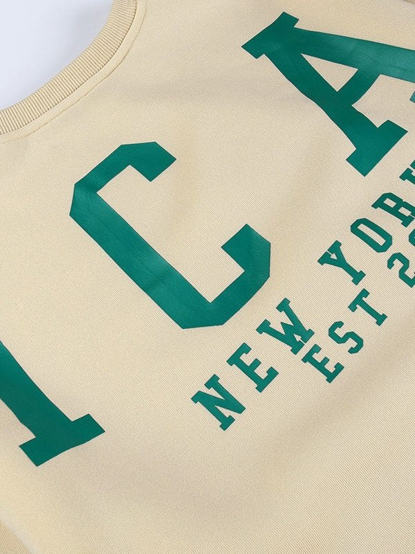 OVERSIZED VARSITY SWEATSHIRT WITH GREEN LETTER GRAPHIC