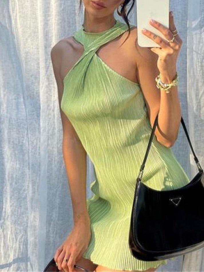 PLEATED GREEN HALTER MINI DRESS FOR TIMELESS STYLE