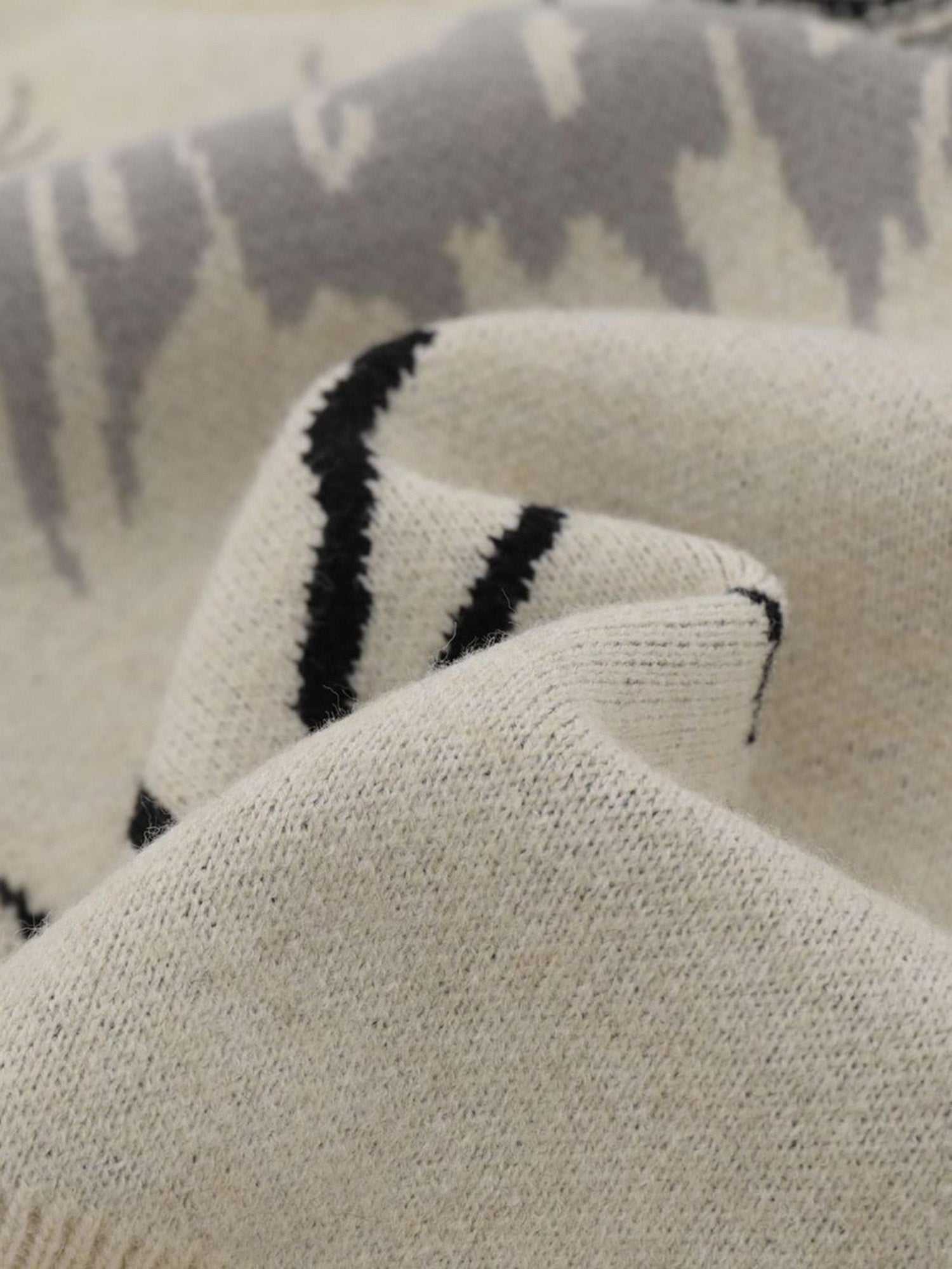 SPIDER-INSPIRED KNITTED SWEATER WITH WEB DESIGNS - STYLISH ADDITION