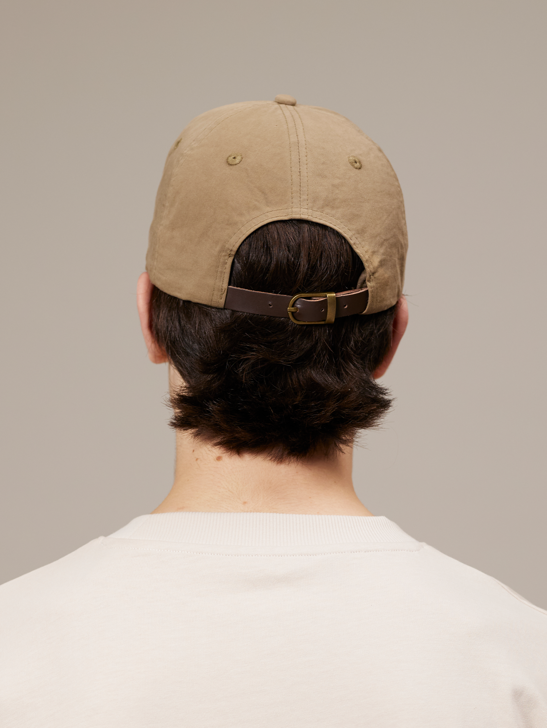 TAN BASEBALL CAP WITH SUN AND SCRIPT LEATHER SNAP CLOSURE