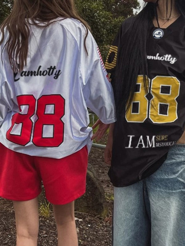 TWO SHORT SLEEVE JERSEYS WITH CONTRAST COLORS AND RETRO PRINT