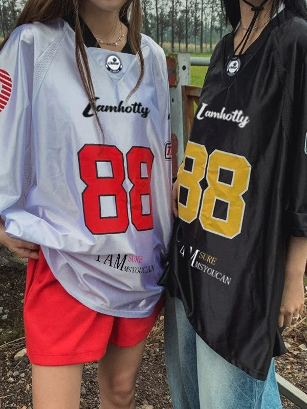 TWO SHORT SLEEVE JERSEYS WITH CONTRAST COLORS AND RETRO PRINT