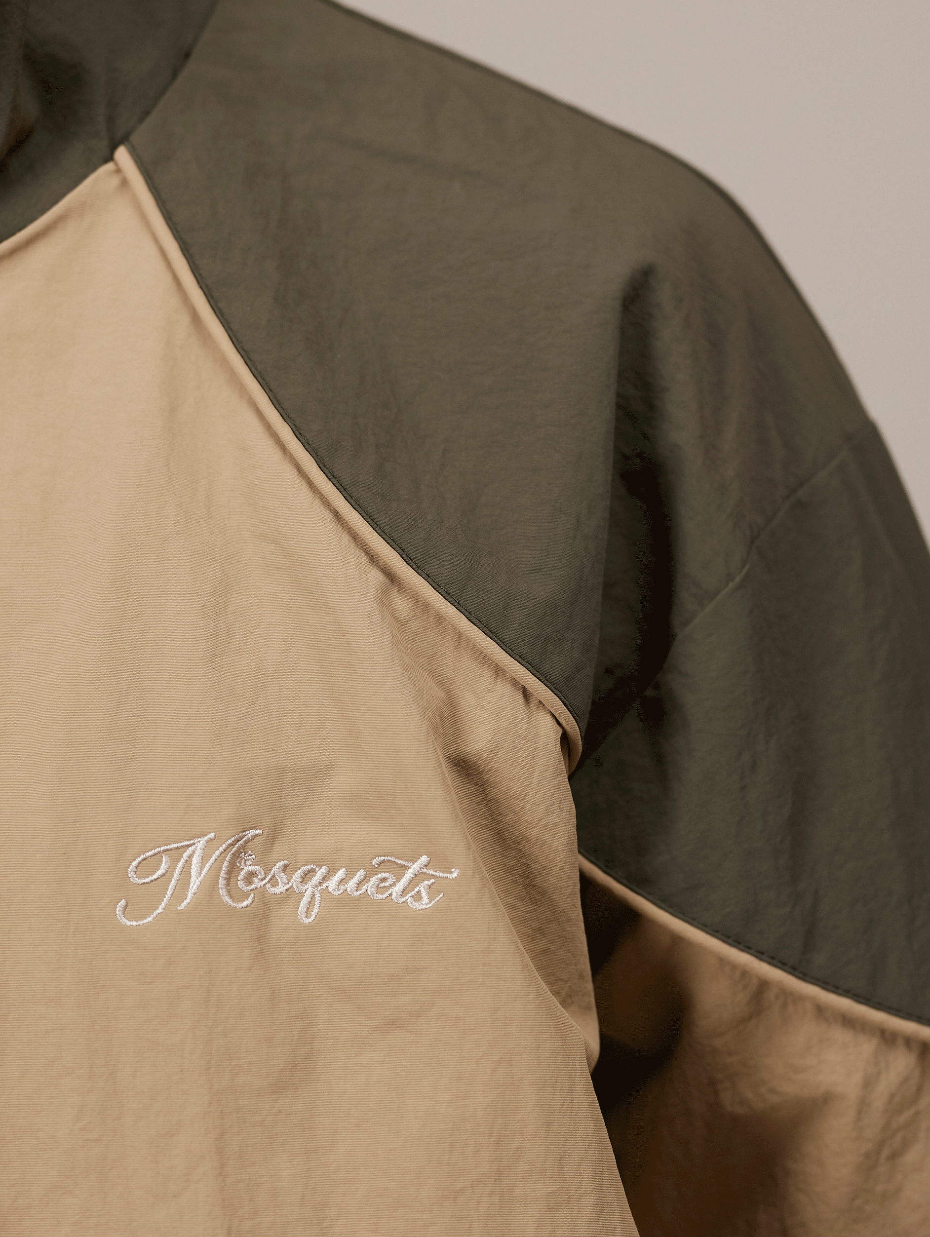 TWO-TONE ZIP-UP JACKET IN DARK GREEN CRINKLE NYLON