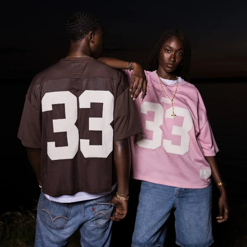 UNISEX MESH SPORTS JERSEYS IN PINK AND BROWN FOR AN ACTIVE LIFESTYLE