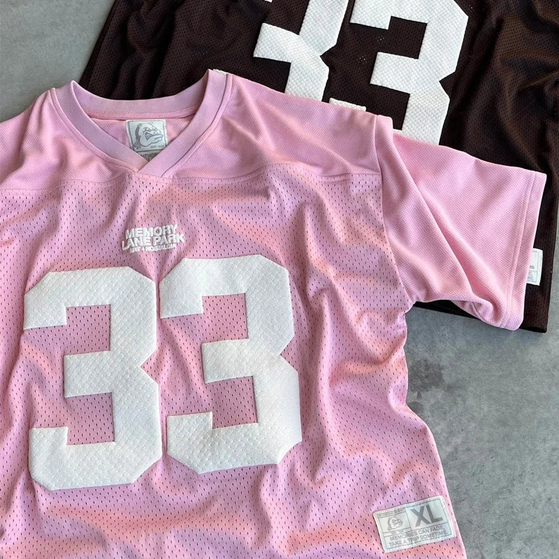 UNISEX MESH SPORTS JERSEYS IN PINK AND BROWN FOR AN ACTIVE LIFESTYLE