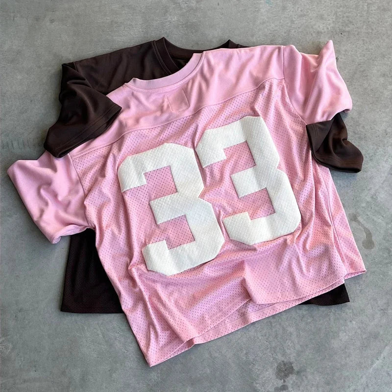 UNISEX MESH SPORTS JERSEYS IN PINK AND BROWN FOR AN ACTIVE LIFESTYLE