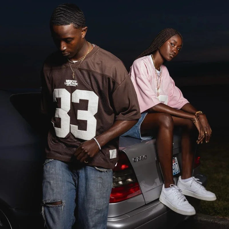 UNISEX MESH SPORTS JERSEYS IN PINK AND BROWN FOR AN ACTIVE LIFESTYLE