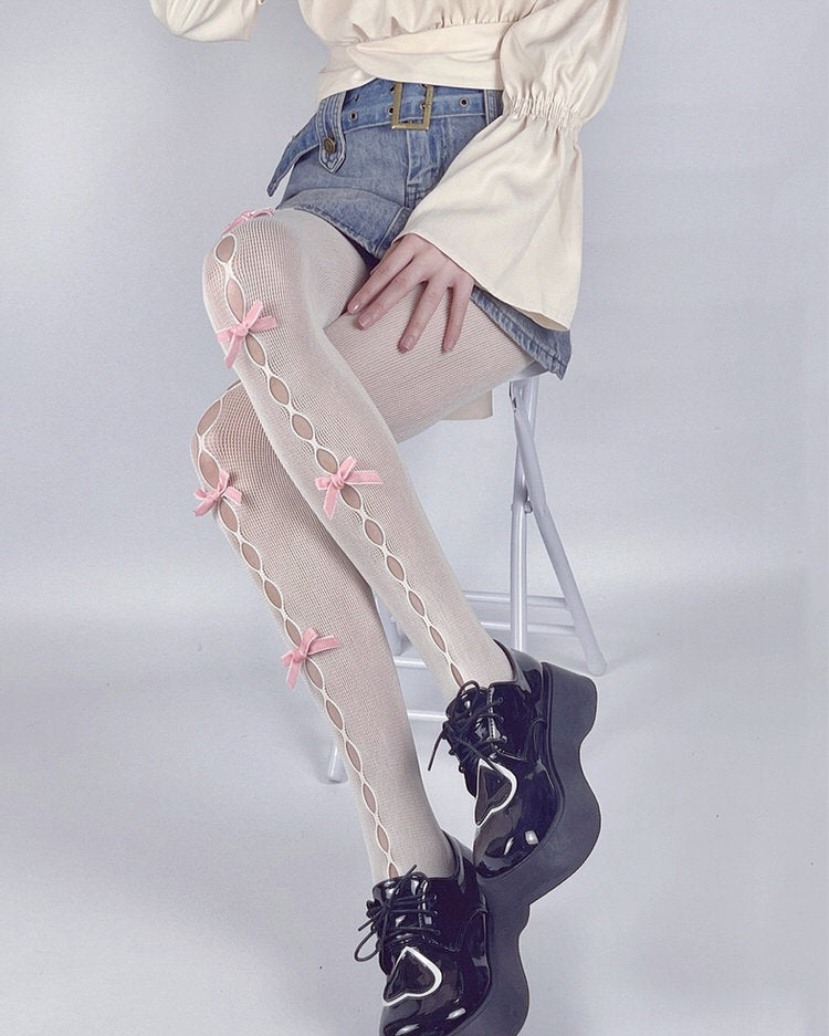 WHITE KNITTED BABY BLANKET WITH PINK BOWS FOR INFANTS