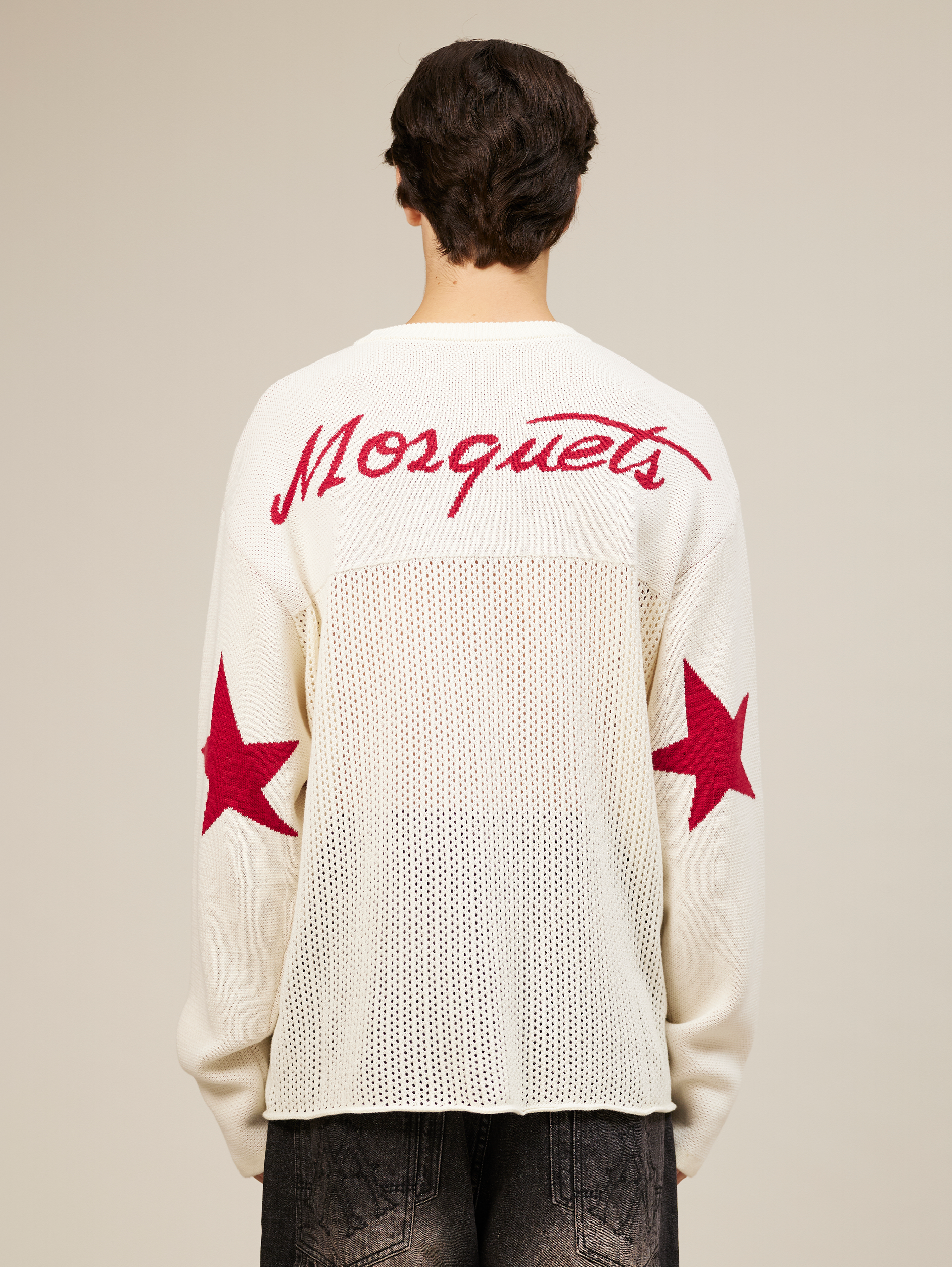 WHITE OVERSIZED KNIT SWEATER WITH RED STARS AND NUMBER 777