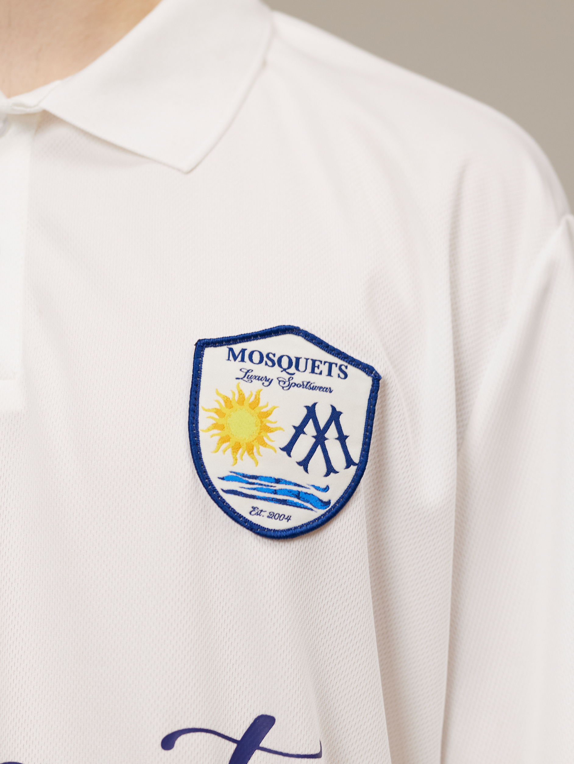 WHITE POLO SHIRT WITH DROPPED SHOULDER DESIGN