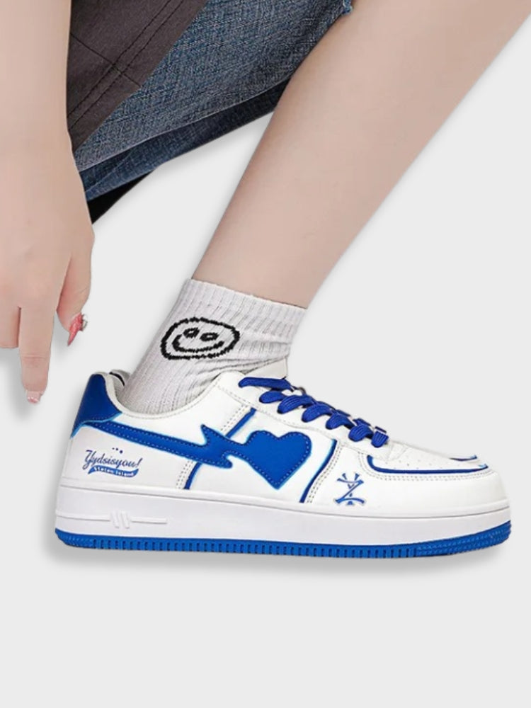 WHITE RETRO SNEAKERS WITH GREEN HEART AND STAR ACCENTS CLEAN WHITE