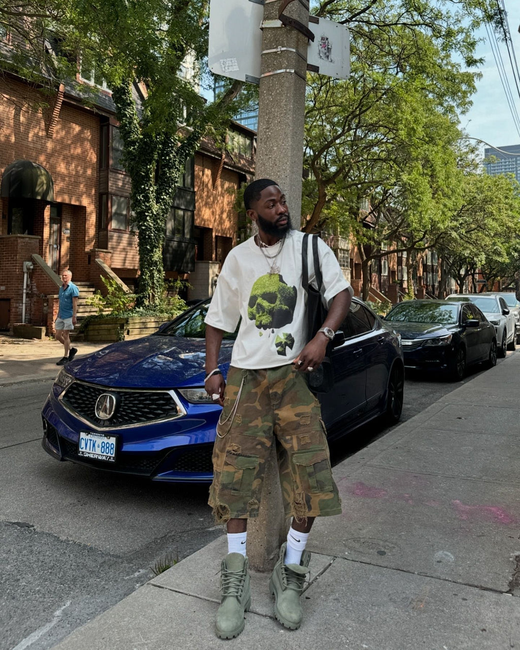 WHITE SHORT SLEEVE T-SHIRT WITH GREEN SKULL GRAPHIC - COOL CASUAL LOOK