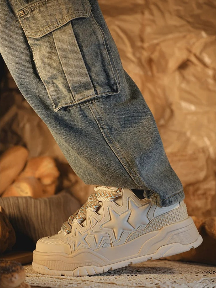 WHITE SNEAKERS WITH BLACK STAR ACCENTS VINTAGE TRIPLE STAR DESIGN