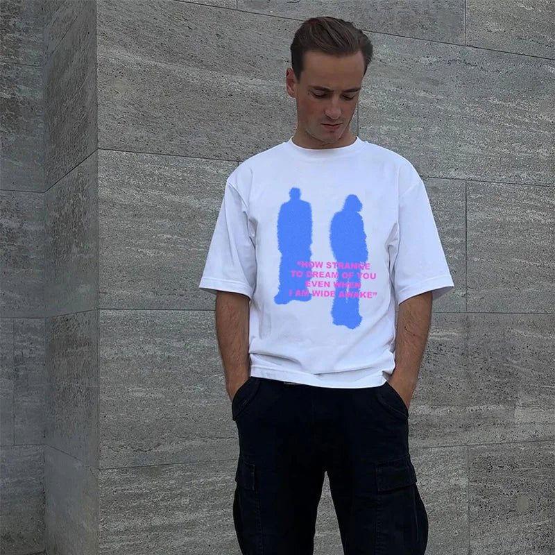 WHITE TEE SHIRT WITH BLUE FIGURES AND PINK TEXT - STYLISH TEE