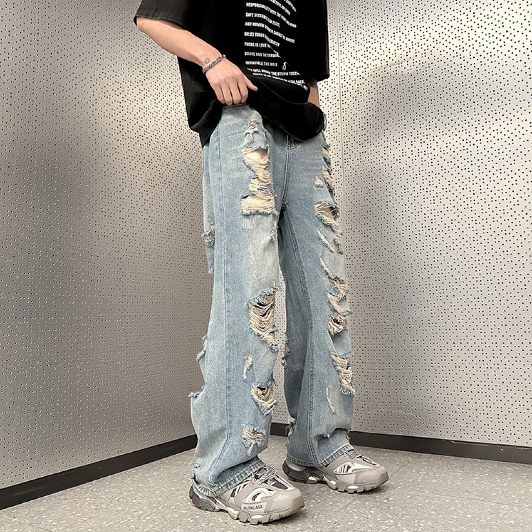 WIDE-LEG JEANS WITH DISTRESS DETAIL FOR A STREET-LIKE IMPRESSION