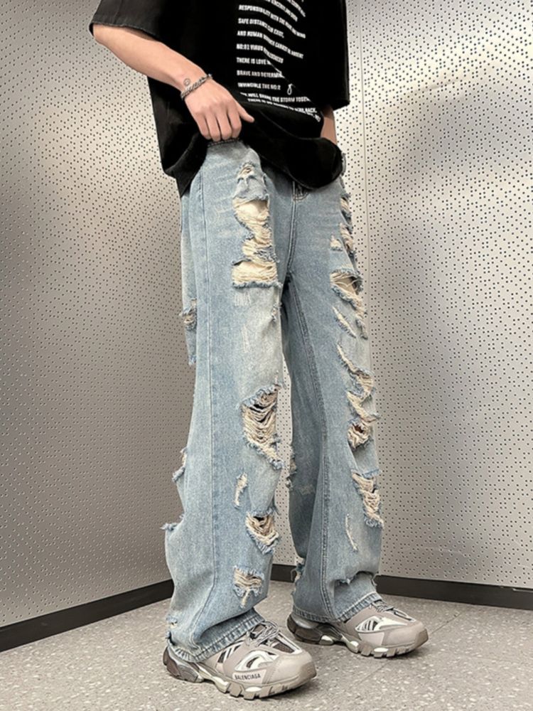 WIDE-LEG JEANS WITH DISTRESS DETAIL FOR A STREET-LIKE IMPRESSION