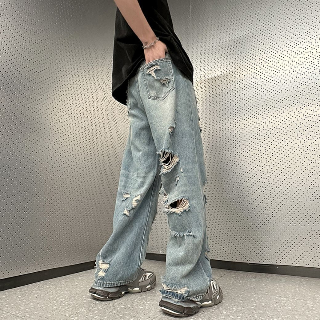 WIDE-LEG JEANS WITH DISTRESS DETAIL FOR A STREET-LIKE IMPRESSION