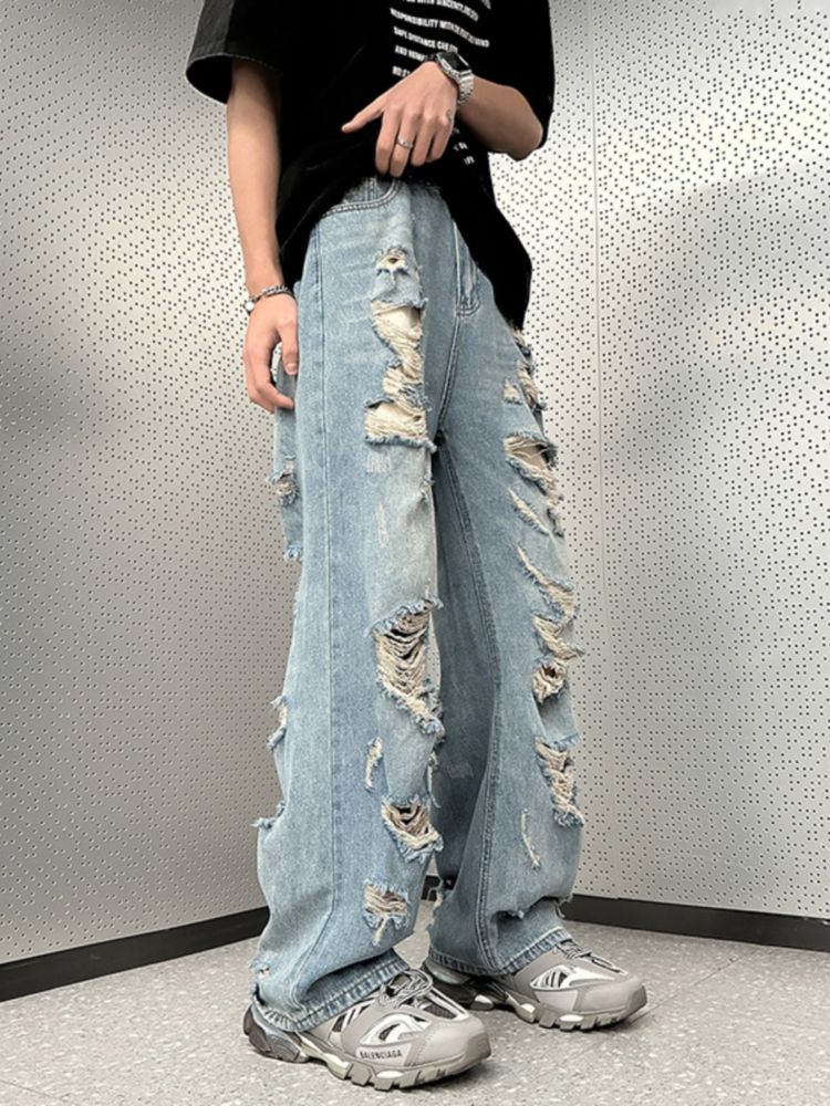 WIDE-LEG JEANS WITH DISTRESS DETAIL FOR A STREET-LIKE IMPRESSION