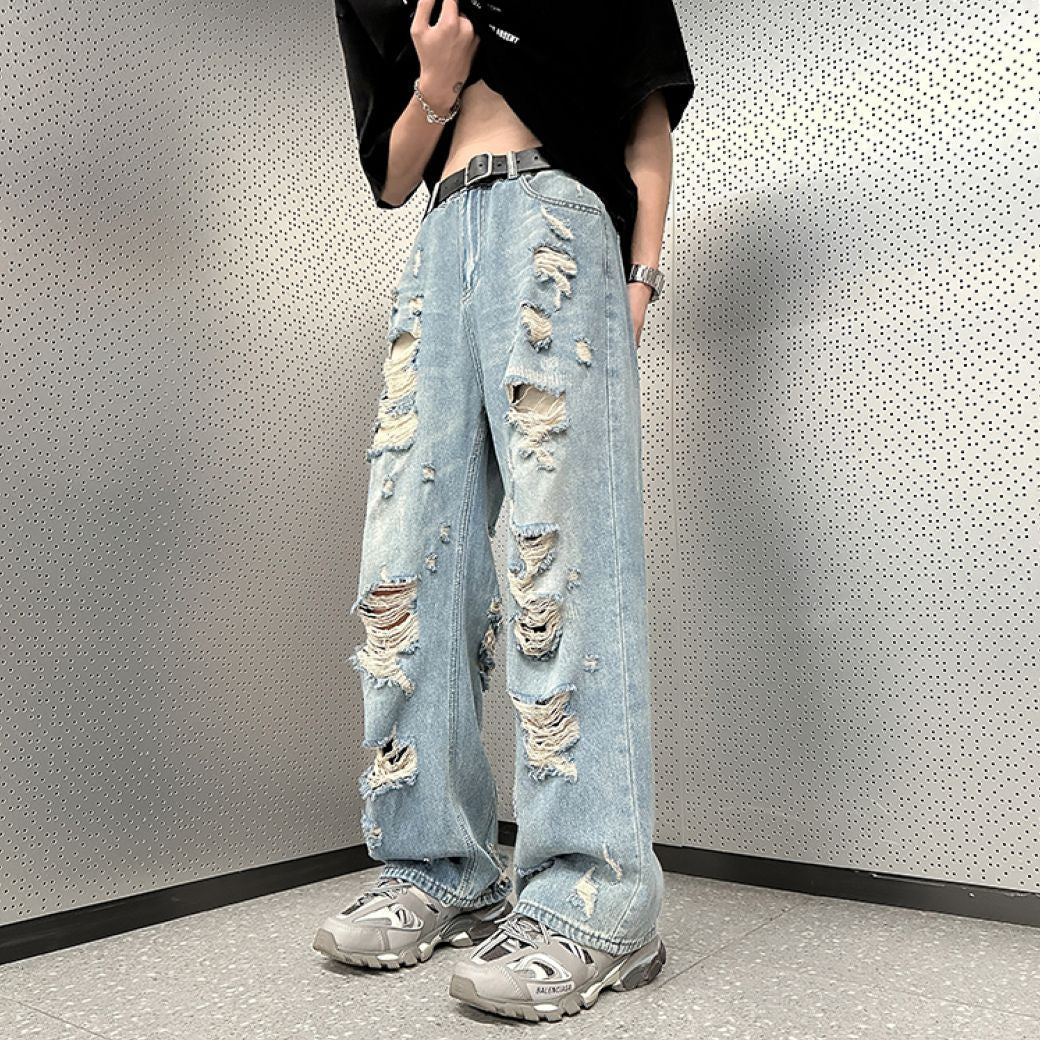 WIDE-LEG JEANS WITH DISTRESS DETAIL FOR A STREET-LIKE IMPRESSION